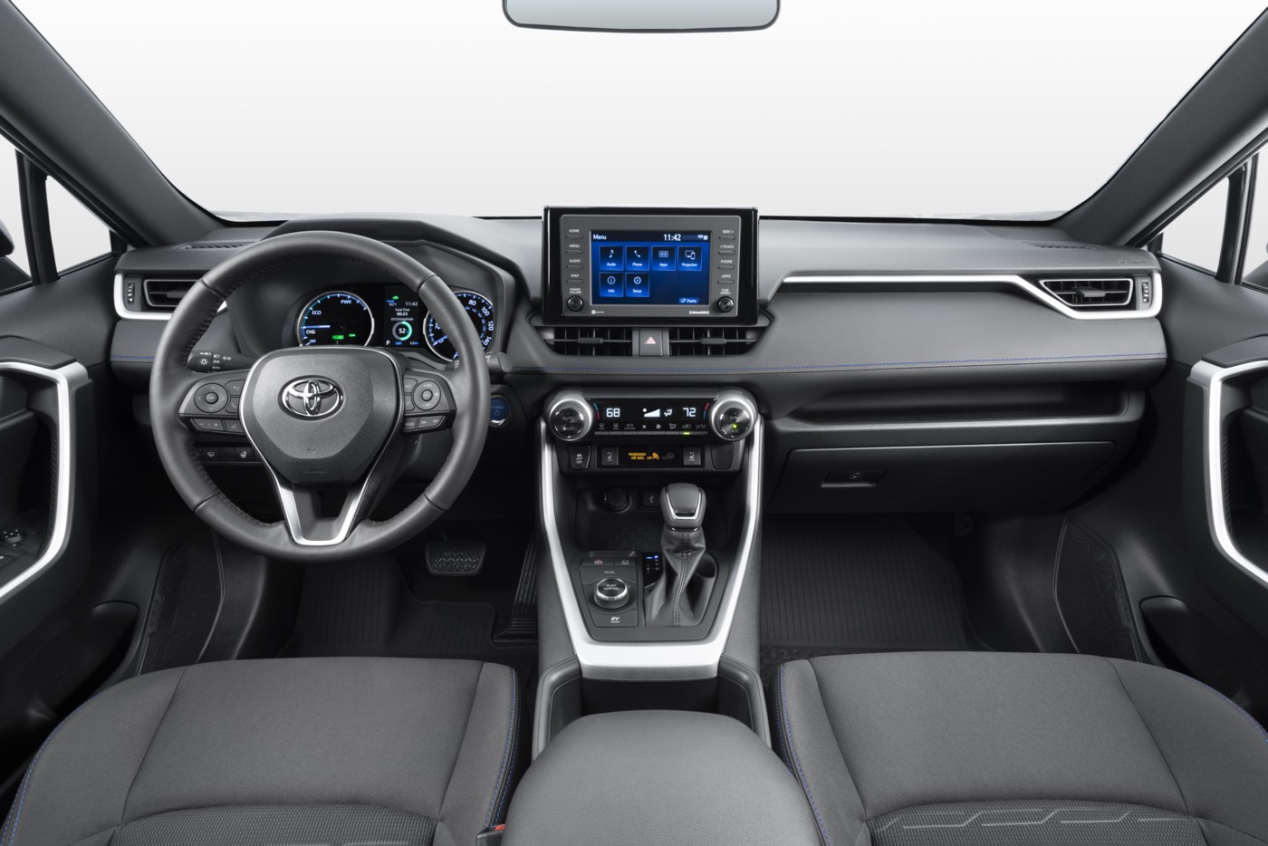 Habitacle avant d'un VUS Toyota RAV4 SE hybride 2022 incluant son ensemble de technologies avancées