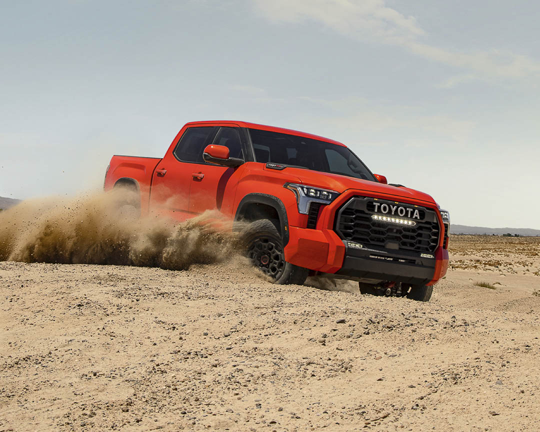 three quarter front view of the 2022 Toyota Tundra in a controlled drift